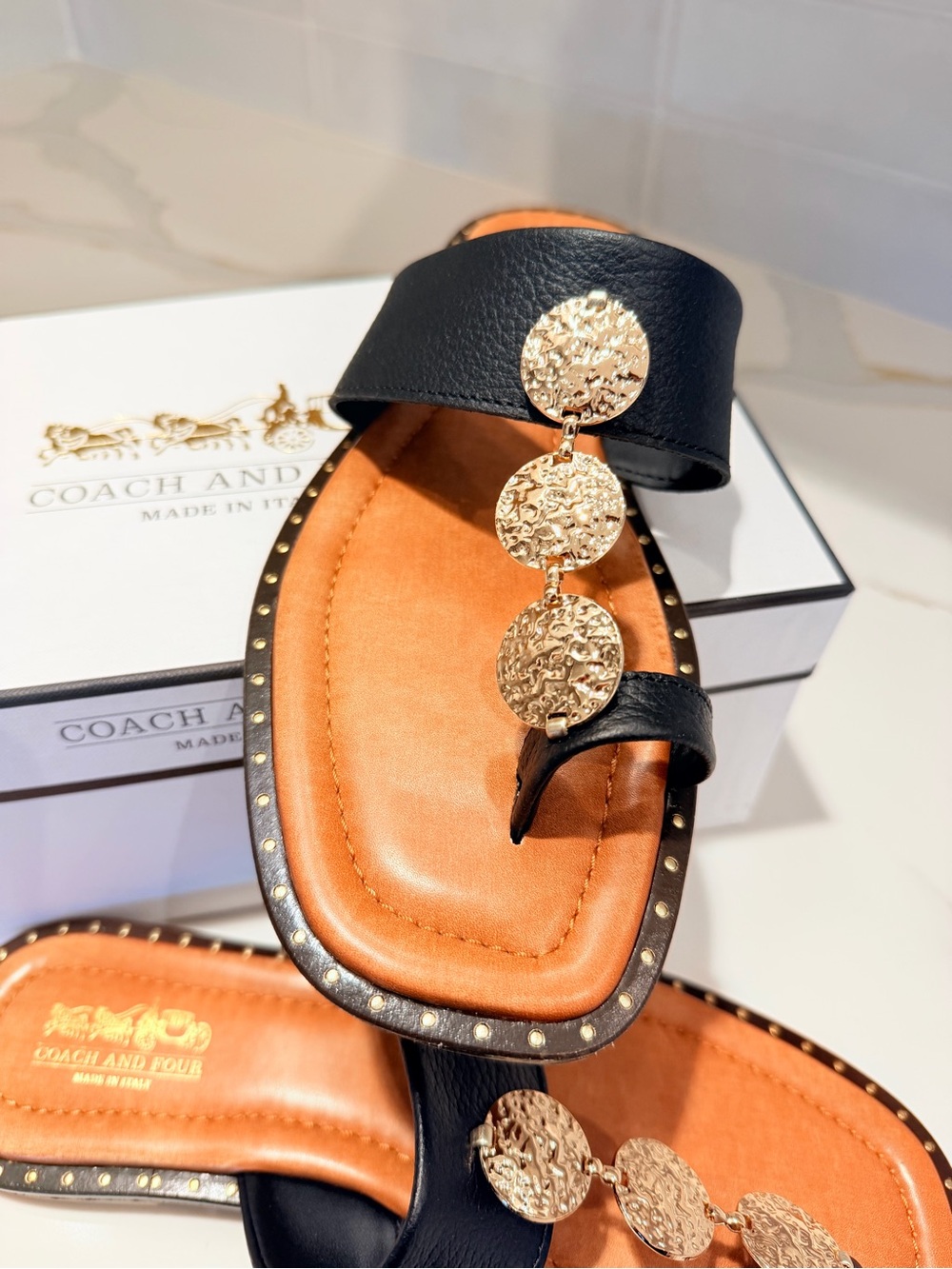 Coach and Four Black and Tan Leather Slide Sandals with Gold Accents - Picture 2 of 15